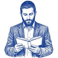 Мужчина в кипе читает книгу